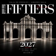 Cartel de la Gala de los Premios FIFTIERS 2027 en Madrid, el 27 de abril, con la Puerta de Alcalá formada por láminas metálicas de un código de barras.